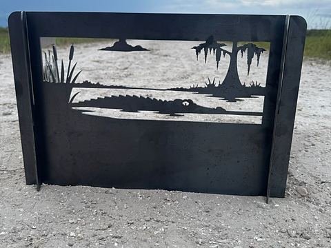 Steel panel cut with an alligator, cattails and a mossy cypress