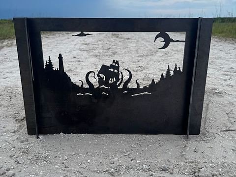 Steel panel cut with a kraken pulling down a ship under a crescent moon